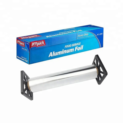 Nourriture faisant le petit pain cuire au four de papier résistant de papier d'aluminium avec le coupeur de dent de scie