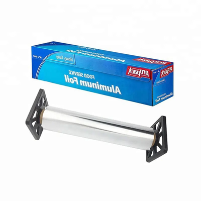 Nourriture faisant le petit pain cuire au four de papier résistant de papier d'aluminium avec le coupeur de dent de scie