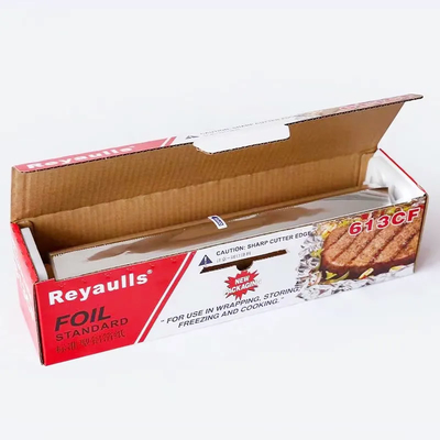 Cuisine de catégorie comestible faisant cuire le petit pain de papier d'aluminium avec la lame en plastique en métal de support